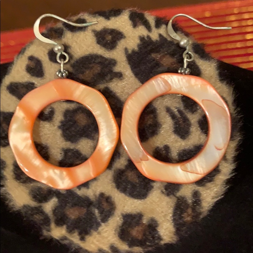 Orange shell earrings.